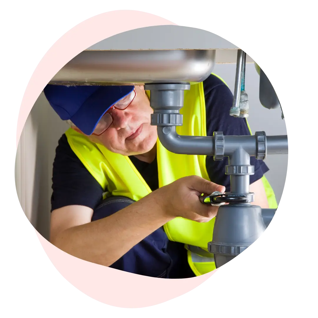 Image of a plumber at work to illustrate mobile services using Google Business Profiles